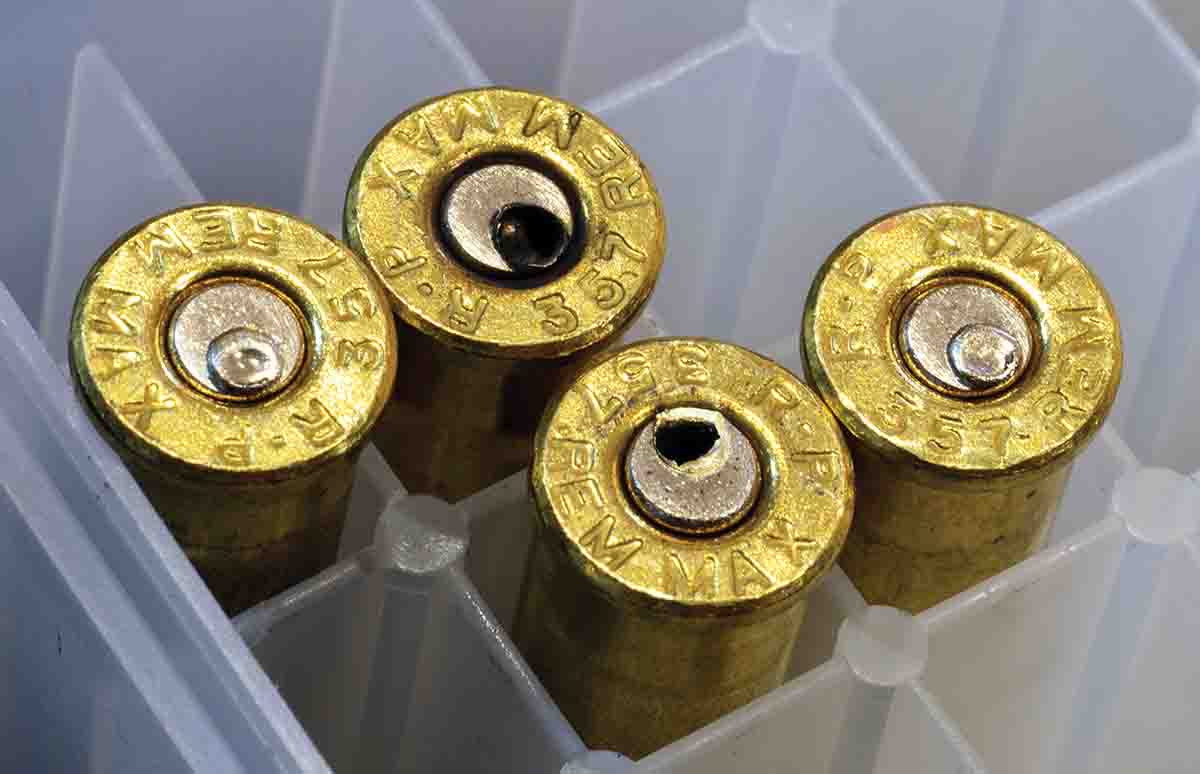 These cartridges all have small magnum pistol primers, which proved too soft for 357 Maximum pressures. The primers that are not actually pierced show indications of excessive pressure in that they are bulged out almost to bursting point.